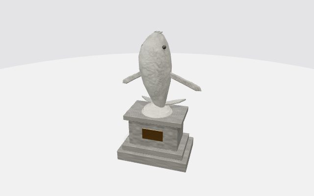 breaching whale statue